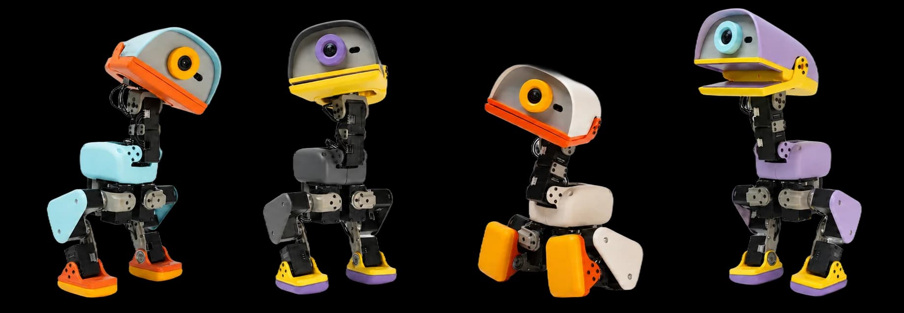 Four Microducks in different colourways, standing in a row